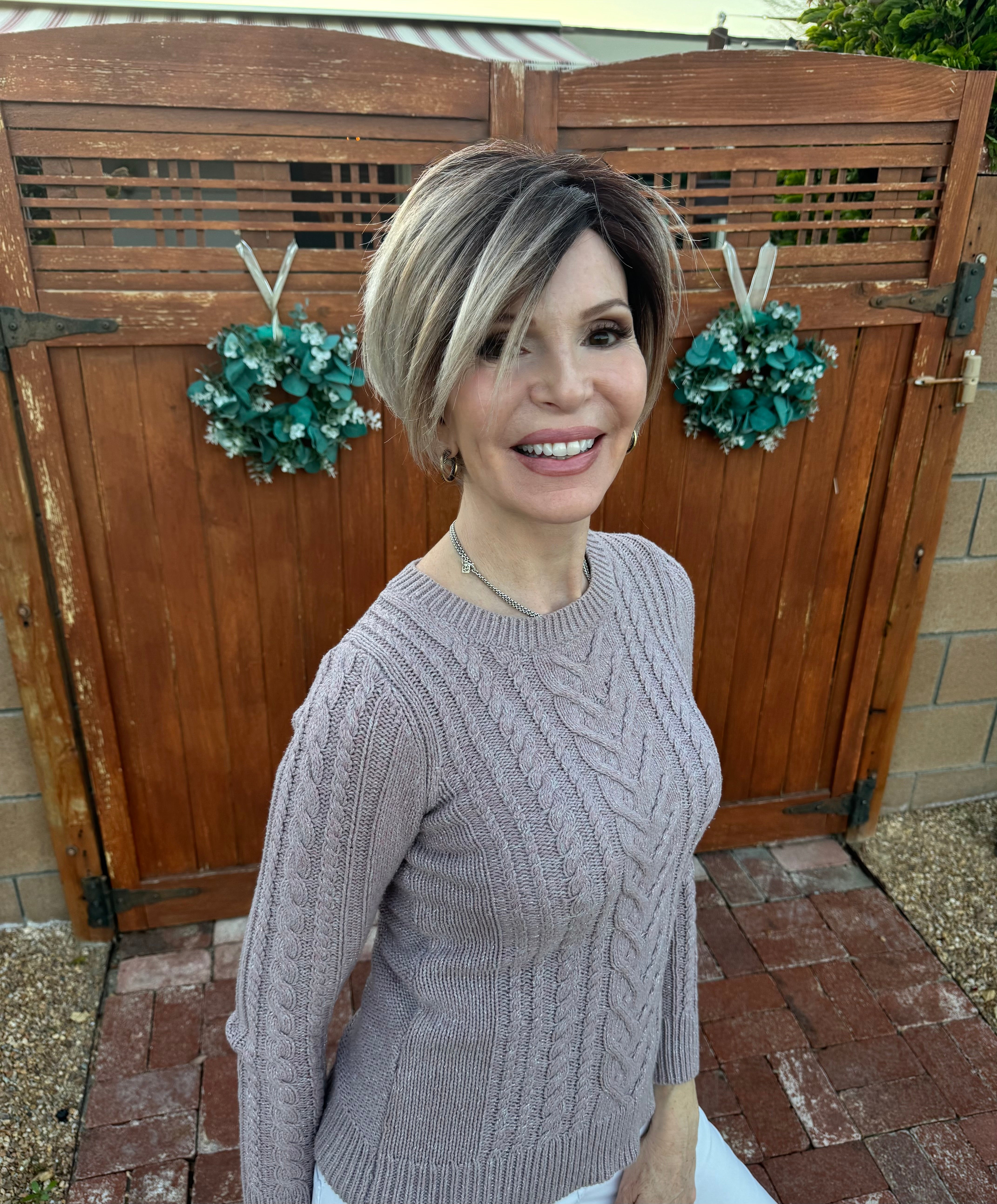 Adeline by Wigvana—a captivating fusion of the timeless pixie and the chic bob. With cheek-length layers and a modern, edgy texturized cut, Adeline redefines contemporary style with a touch of boldness and sophistication.