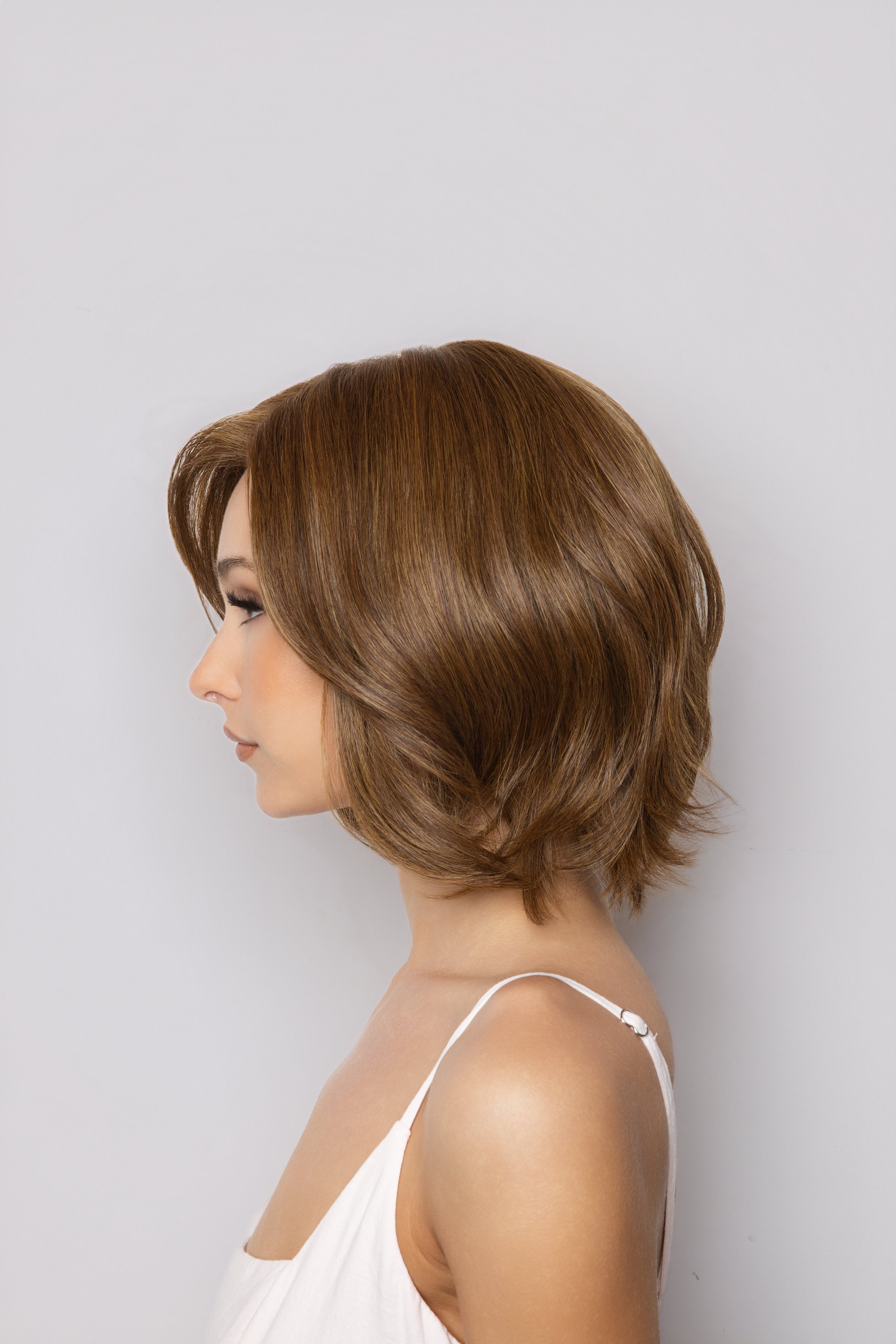 Farren by Noriko. /  Heat Friendly Synthetic / Extended Lace Front, Monofilament top, Hand Tied