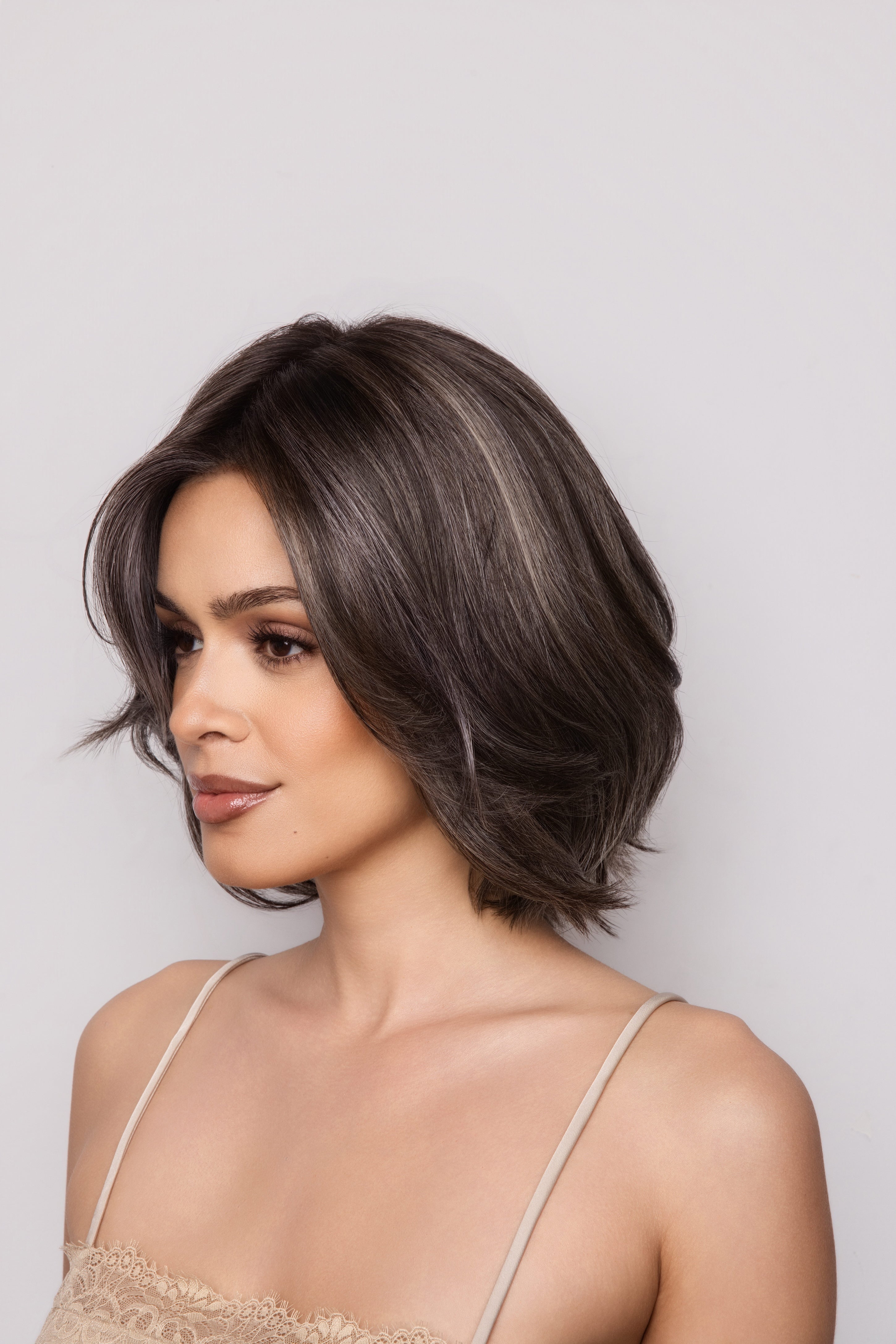 Farren by Noriko. /  Heat Friendly Synthetic / Extended Lace Front, Monofilament top, Hand Tied