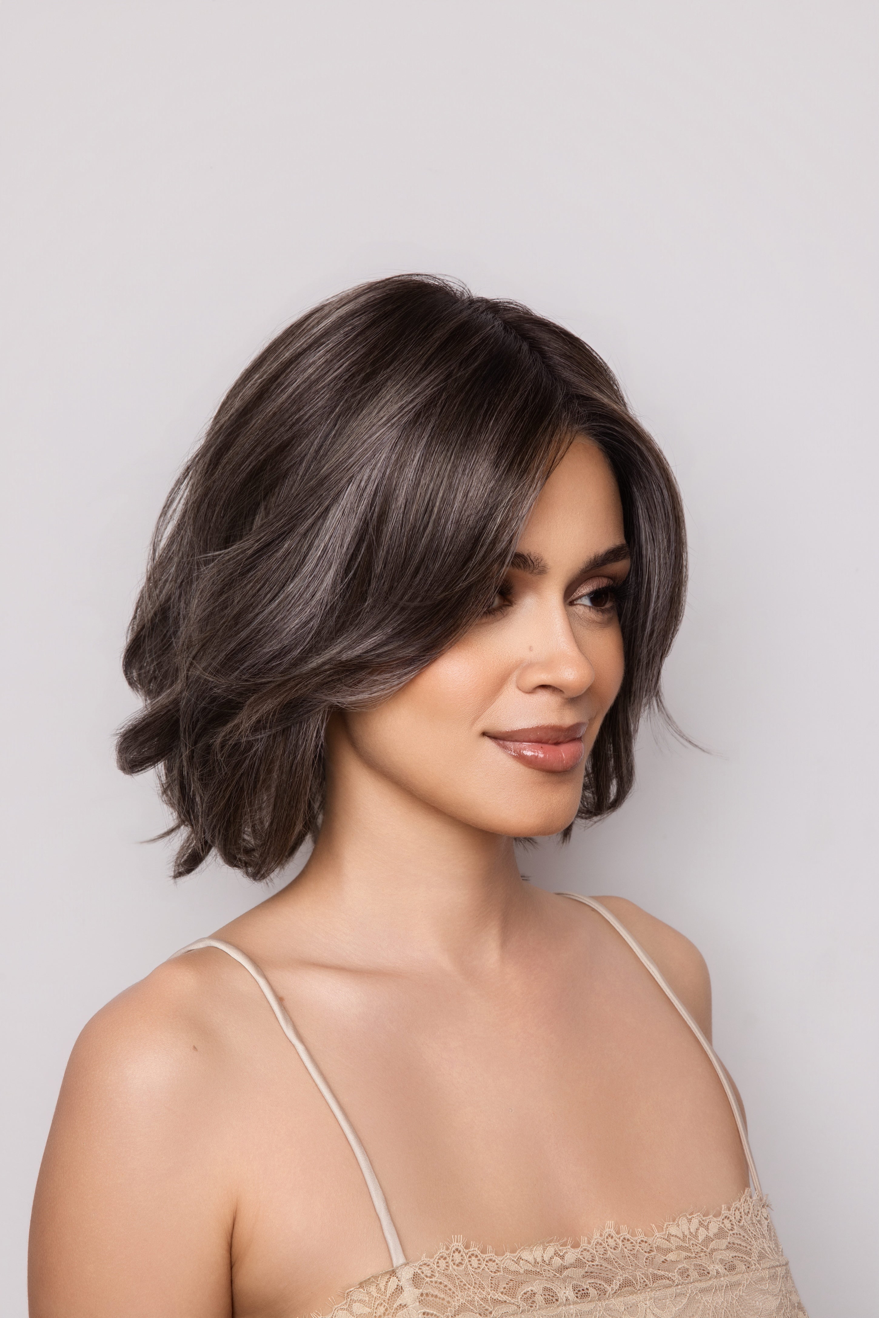 Farren by Noriko. /  Heat Friendly Synthetic / Extended Lace Front, Monofilament top, Hand Tied