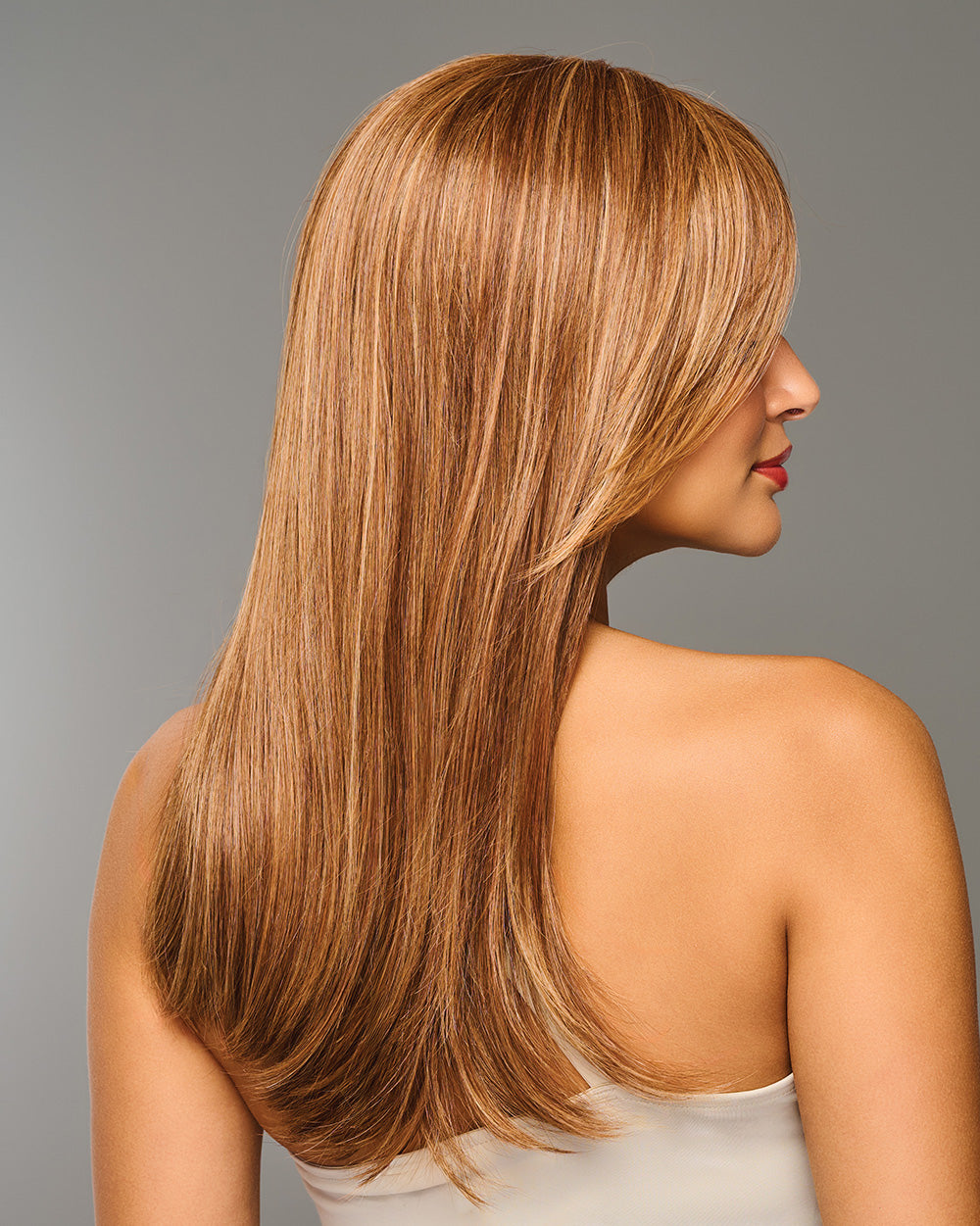 Model is wearing Sleek Sophistication by Raquel Welch in RL30/27 Rusty Auburn