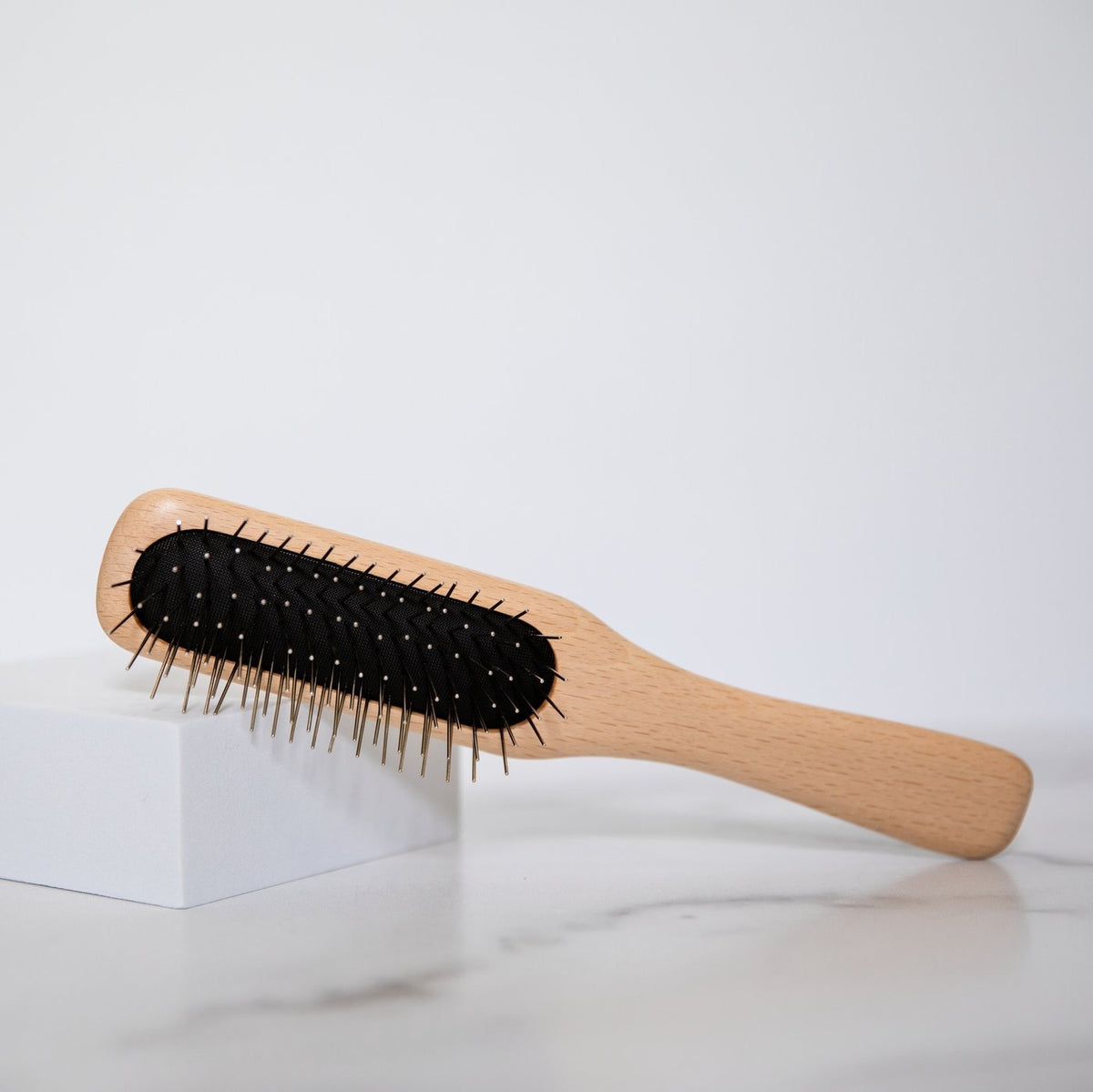 Wire wig brush